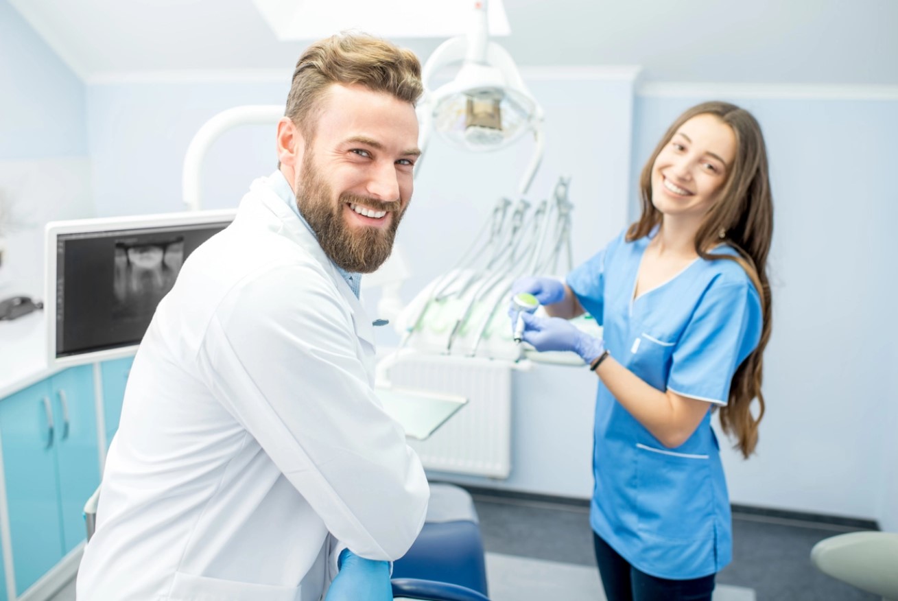 patient and dentist smiling